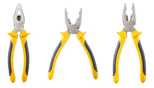 three yellow and  black pliers isolated - Foto, imagen