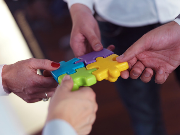 business people group assembling jigsaw puzzle - Photo, Image