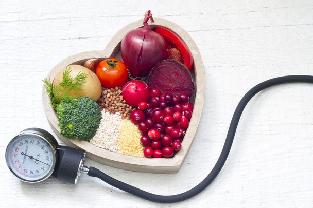 Healthy food in heart and lowering pressure sign concept - Photo, Image