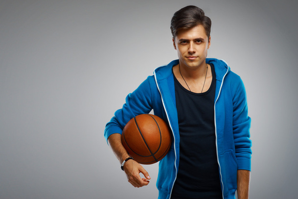 Portrait of a young man basketball player - 写真・画像
