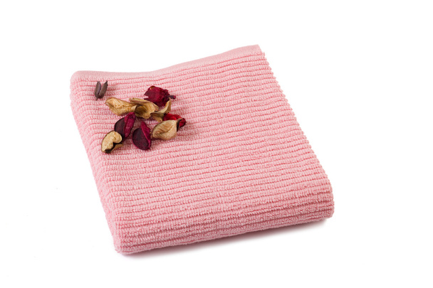 toalla rosa con flores secas
 - Foto, Imagen