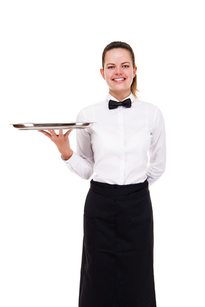 Mujer joven en bandeja de sujeción uniforme camarero aislado sobre blanco b
 - Foto, imagen