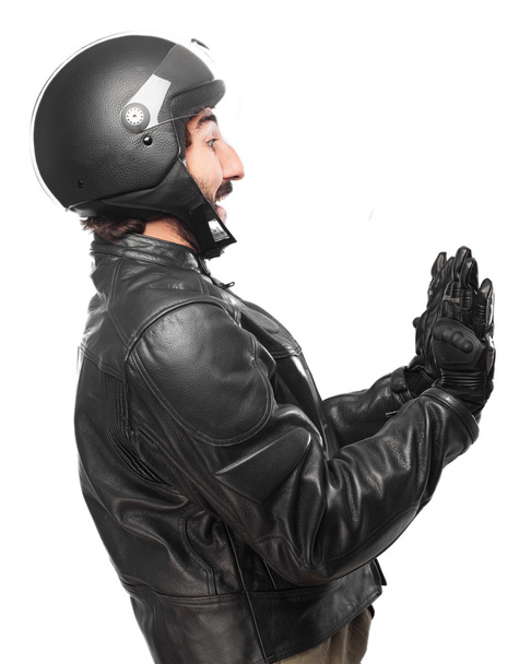 scared biker with stop gesture - Foto, Bild
