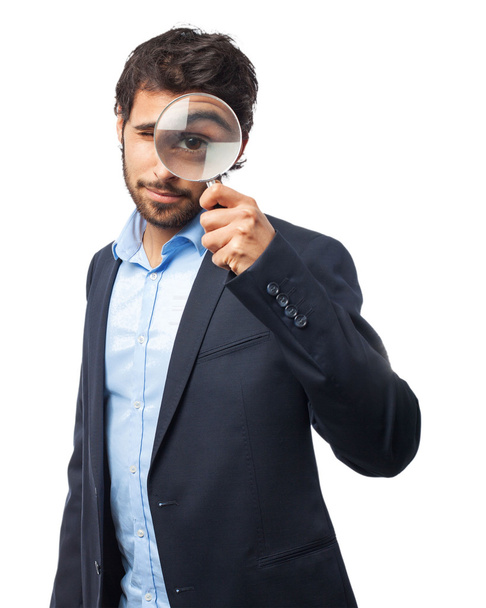 happy businessman with magnifying glass - 写真・画像