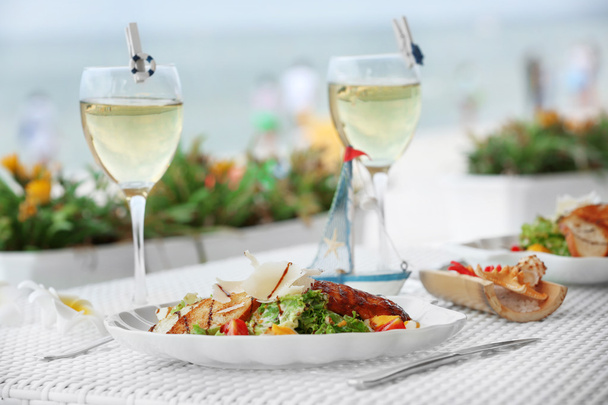 Tasty salad with served wine - Foto, immagini