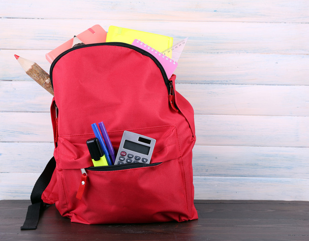 bag with school equipment - Foto, afbeelding