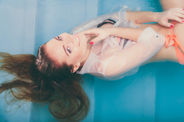 woman in swimming pool water - Fotó, kép