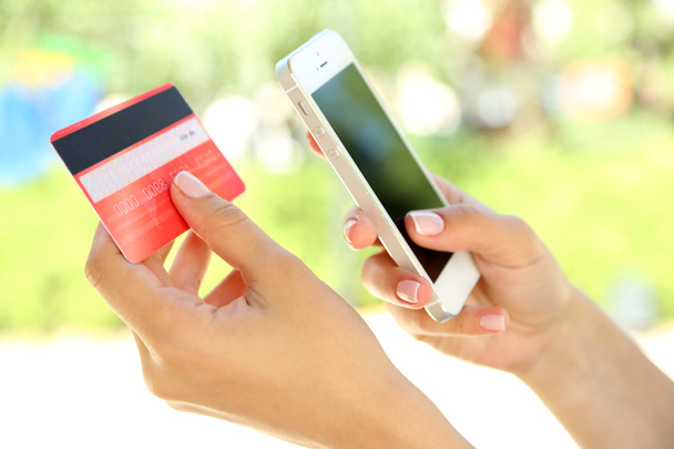 mobile banking used by woman - Photo, image