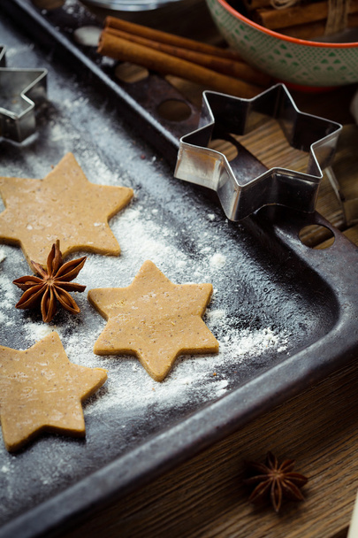 christmas cookies on baking tray - Фото, изображение
