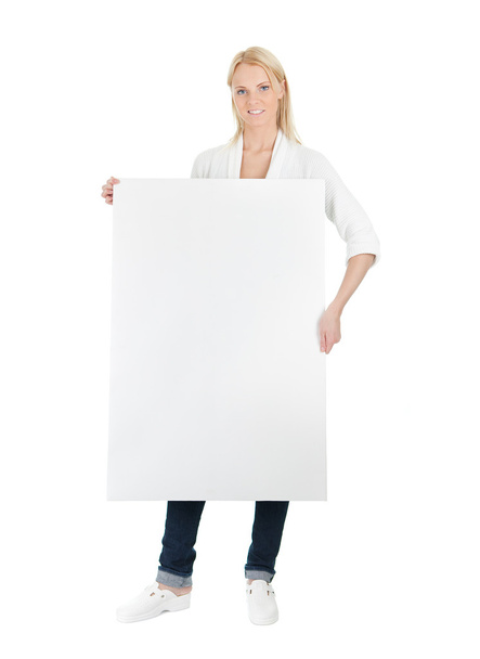 Beautiful young woman presenting empty board - Foto, Imagen
