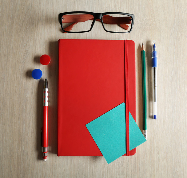 Red notebook with stationery   - Fotoğraf, Görsel