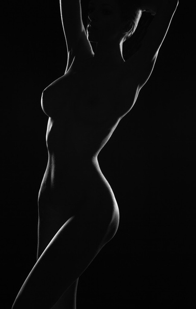 young naked girl posing in studio. - Foto, Imagen