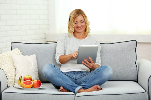 woman with fresh fruits and digital tablet  - Photo, Image