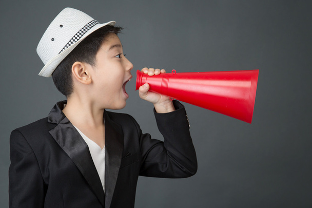 Little asian boy using megaphone shouting - Fotografie, Obrázek