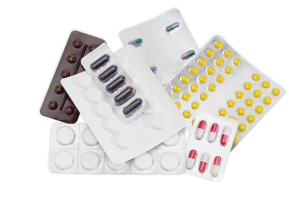 Several packaging of medications on a light background - Photo, Image