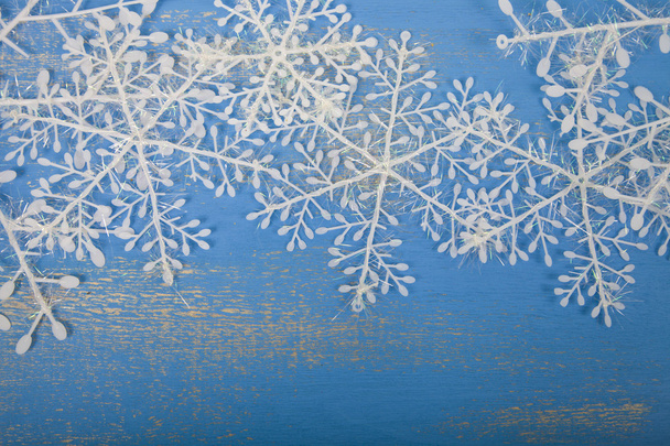 Snowflakes on a blue background - Фото, зображення