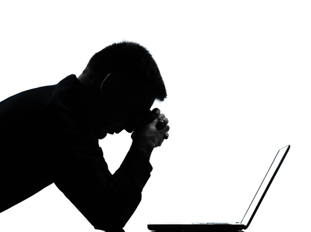 One business man silhouette computing computer laptop despair sad - Foto, Imagen