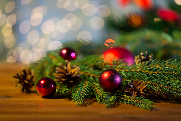 fir branch with christmas ball and pinecones - Valokuva, kuva