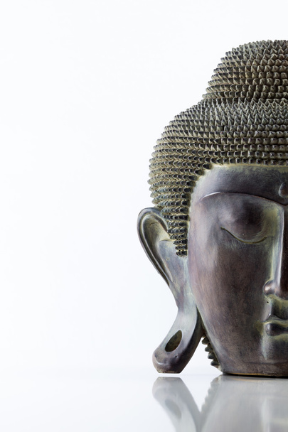 Buddha head on a white background - Фото, зображення