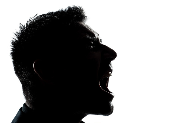 Silhouette man portrait profile screaming angry - Foto, imagen