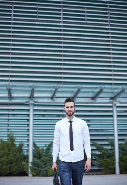 Businessman in front of business building - Photo, image