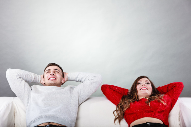 Happy couple relaxing resting on couch at home. - Photo, Image