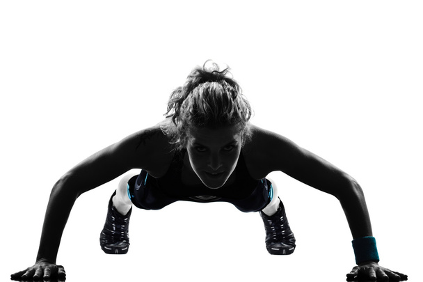 Woman workout fitness push ups posture - Photo, image