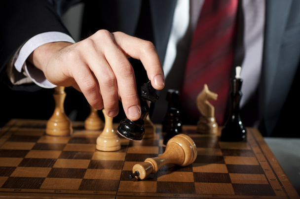 Businessman plays chess - Fotografie, Obrázek