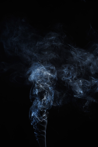 Abstract smoke moves on a black background. - Photo, Image
