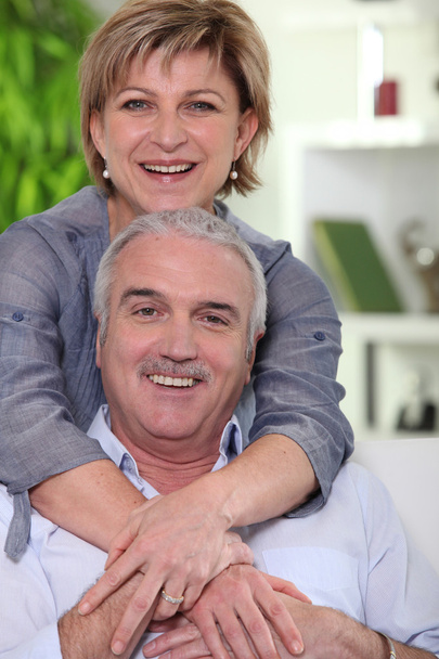 Middle-aged couple looking happy - Foto, imagen