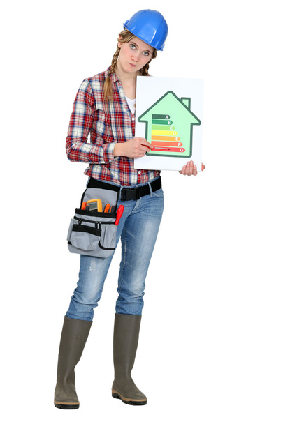 Female worker with an energy efficiency logo - Foto, Imagem