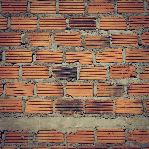 parede feita de tijolo no canteiro de obras de edifícios residenciais
 - Foto, Imagem