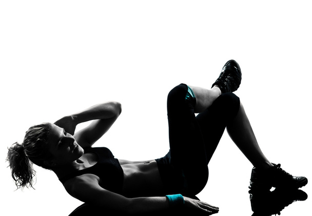 Woman workout fitness posture abdominals push ups - Foto, imagen