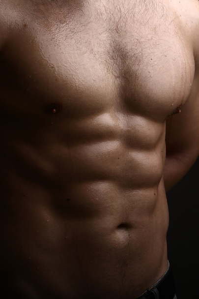 Muscular male wet torso - Foto, Bild
