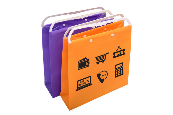 Dos bolsas de compras con iconos de compra en línea
 - Foto, imagen