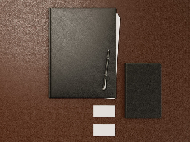 Folder and office supplies on brown leather - Foto, imagen