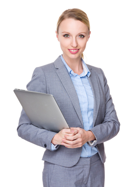 Young caucasian businesswoman in business suit - Foto, afbeelding
