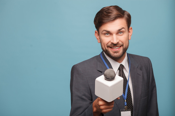 Handsome male reporter is asking for interview - Fotoğraf, Görsel