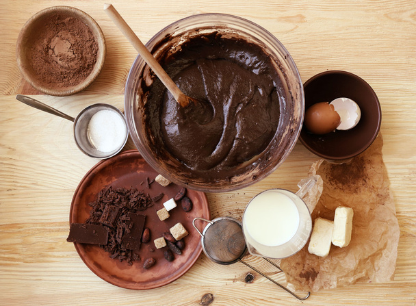 Preparing dough for chocolate pie on table close up - Fotoğraf, Görsel
