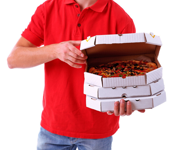 Delivery boy with cardboard pizza boxes isolated on white - Photo, image