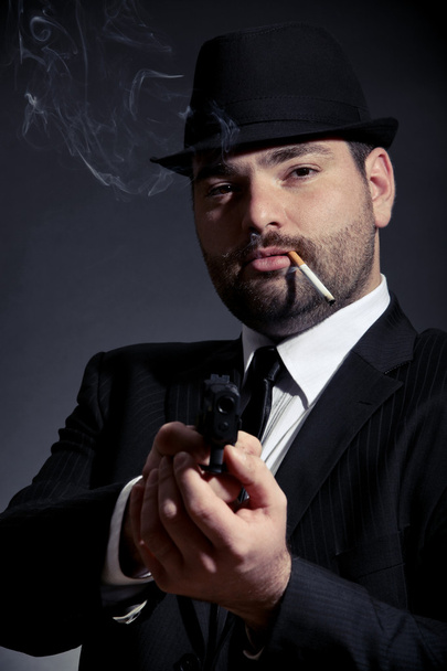 nebezpečný muž s pistolí - Fotografie, Obrázek