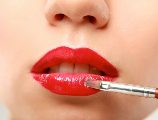 Makeup.Professional Make-up. Lipgloss. Lipstick - Фото, изображение