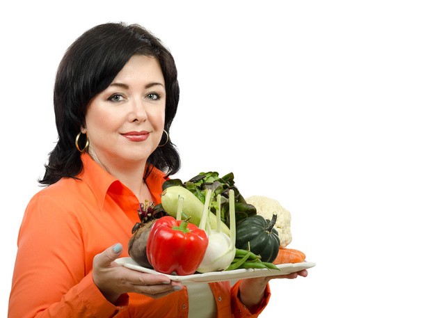 Portrait of dietitian with a tray of fresh vegetables - Fotografie, Obrázek