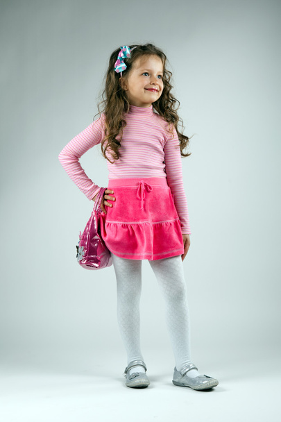 Little girl in a beautiful rose dress - Φωτογραφία, εικόνα