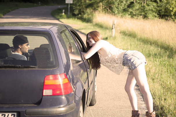 Sexy redhead woman hitchhiking - Foto, Imagem