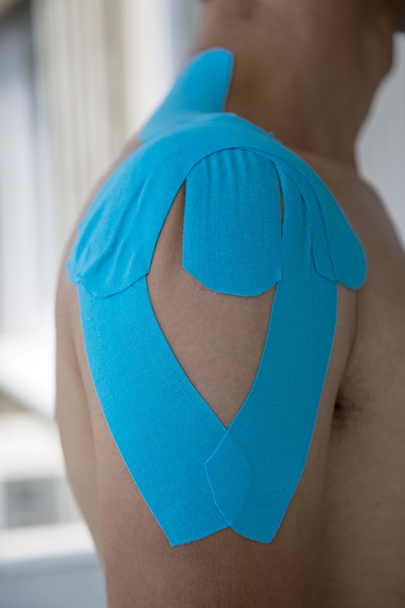 Adhesive bandage on shoulder - Photo, Image