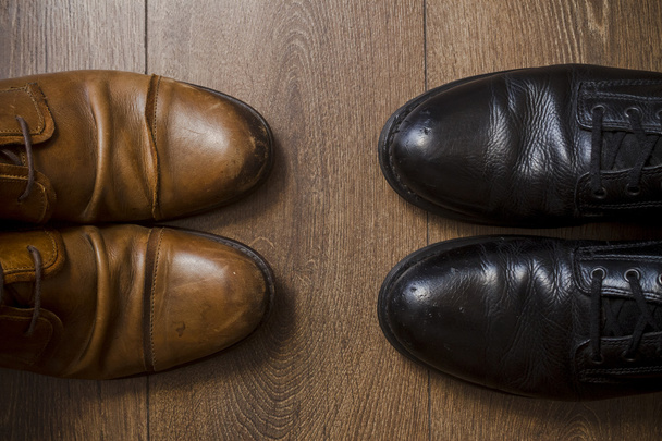 Brown leather shoes on a wooden floor - Foto, Imagem