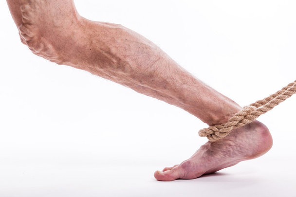 rope holding human leg ailing varicose veins of the lower extrem - Photo, Image
