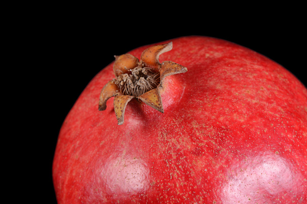 The fresh pomegranate as a background - Foto, immagini