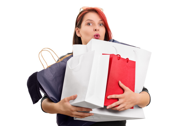 Excited young girl with shopping bags - Photo, Image